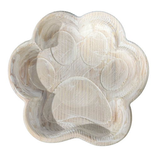 Paw Print dough bowl, empty, showing the design CNC-carved into the bottom